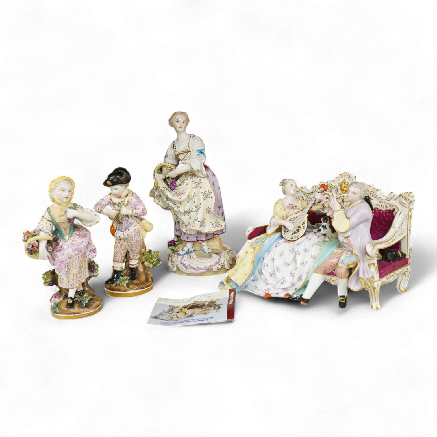 A Meissen style porcelain musical group, a figurine of a lady holding grapes and a two Derby figures of Summer and Autumn, c.1810-30, largest 24cm high